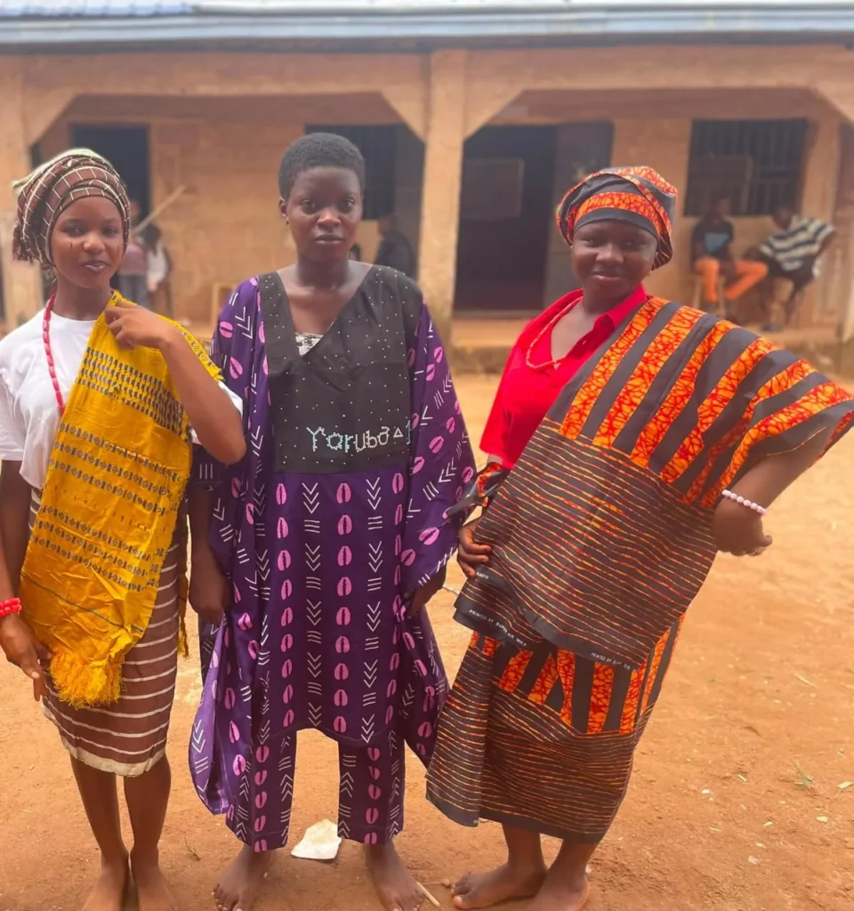 Students showcasing traditional Nigerian attire